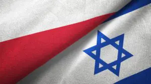 A close up of the flags of israel and poland