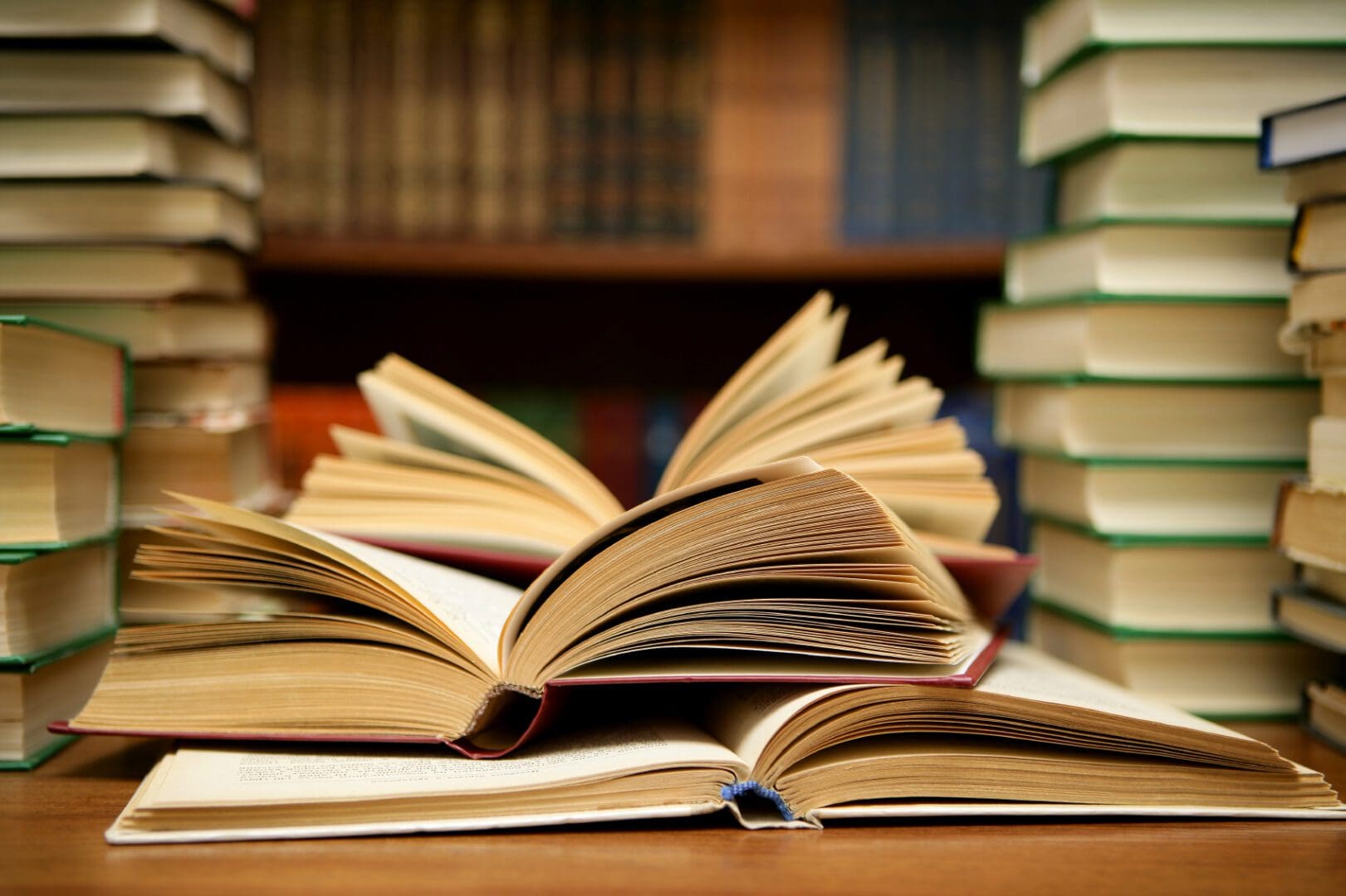 A close up of an open book on top of a table