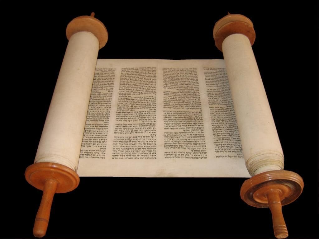 A torah scroll is shown with the pages folded.