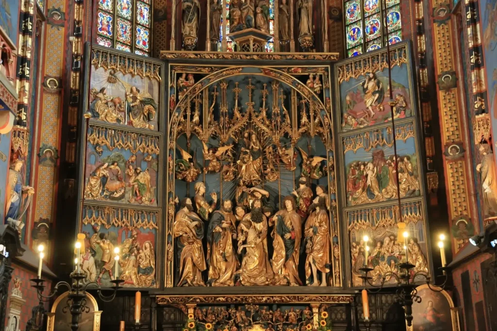 Intricate church altar with detailed religious carvings.