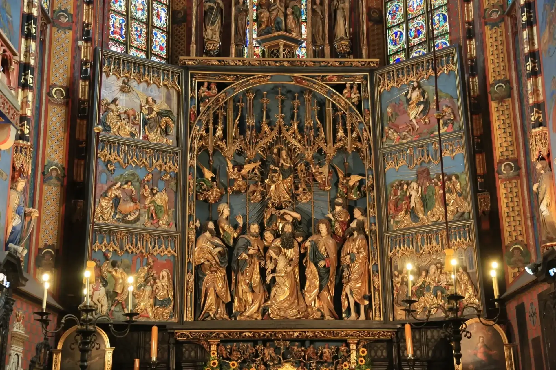 Intricate church altar with detailed religious carvings.