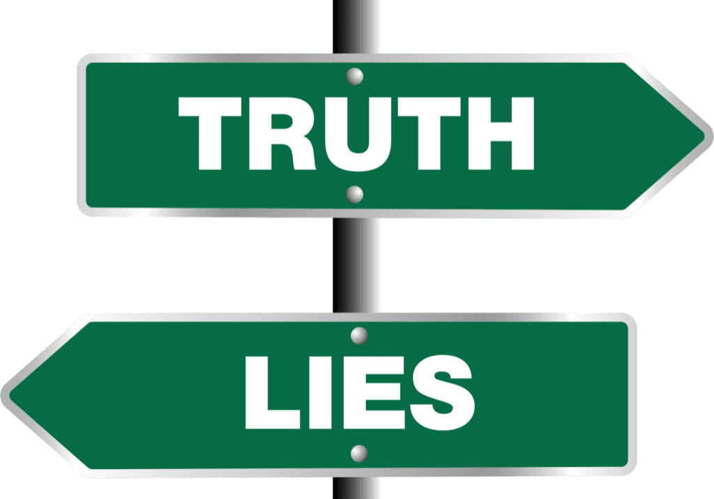A street sign that says truth and lies.