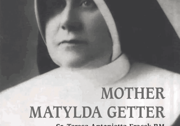 Nun in habit, black and white portrait.